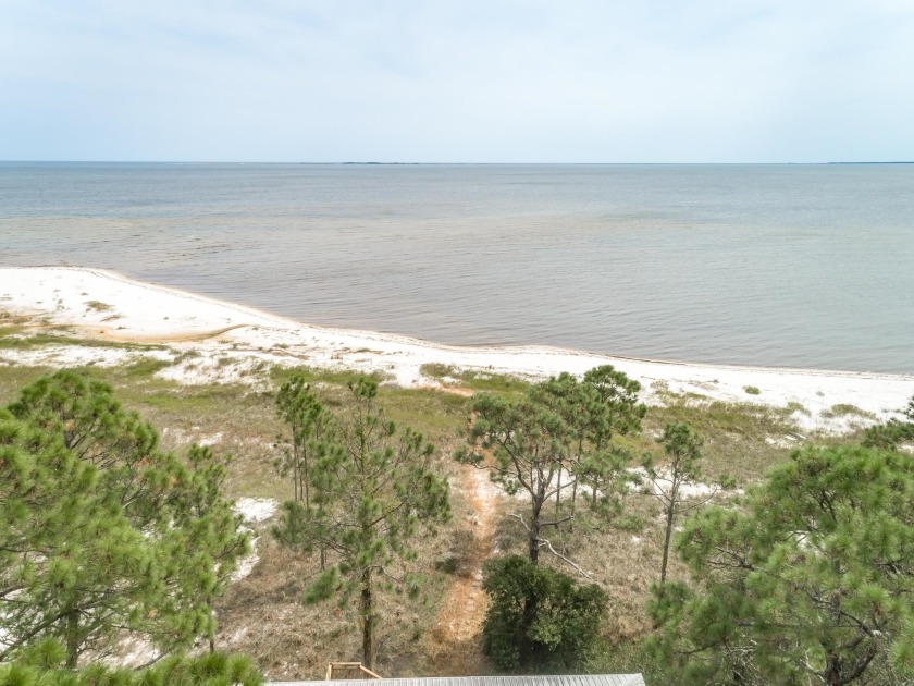 Secluded beachfront retreat with private white sand beach - Beach Home for sale in Carabelle, Florida on Beachhouse.com