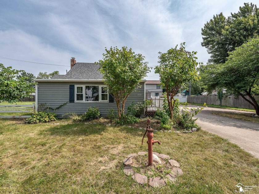 This bungalow-style home is situated on an expansive double-plus - Beach Home for sale in Monroe, Michigan on Beachhouse.com