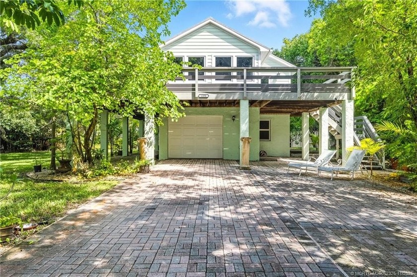Discover this opportunity to own a spacious 4 bedroom home with - Beach Home for sale in Stuart, Florida on Beachhouse.com