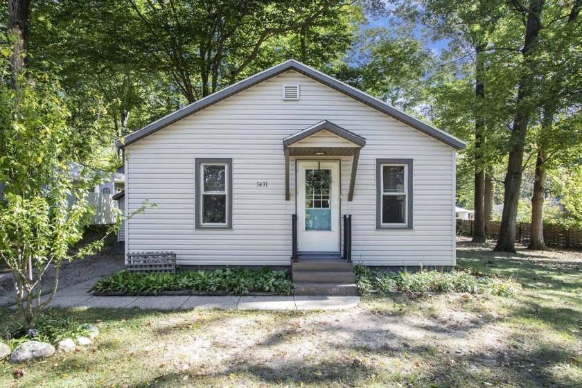 Adorable 2 bed/1 bath Bungalow perfectly located between Big Paw - Beach Home for sale in Coloma, Michigan on Beachhouse.com