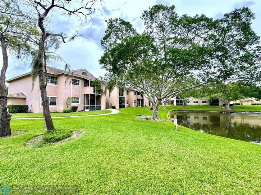 Lake view, first floor, condo features 2 bedrooms and 2 full - Beach Condo for sale in Pompano Beach, Florida on Beachhouse.com