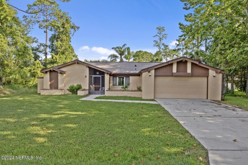 WOW! Checkout this gorgeous newly renovated home. Move in ready! - Beach Home for sale in Palm Coast, Florida on Beachhouse.com