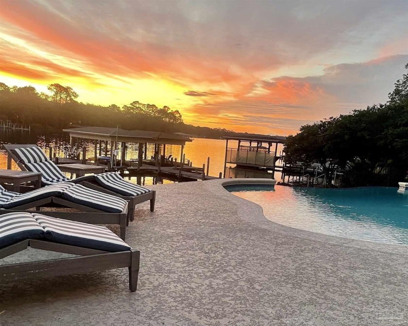 This custom home epitomizes luxury waterfront living. The - Beach Home for sale in Pensacola, Florida on Beachhouse.com