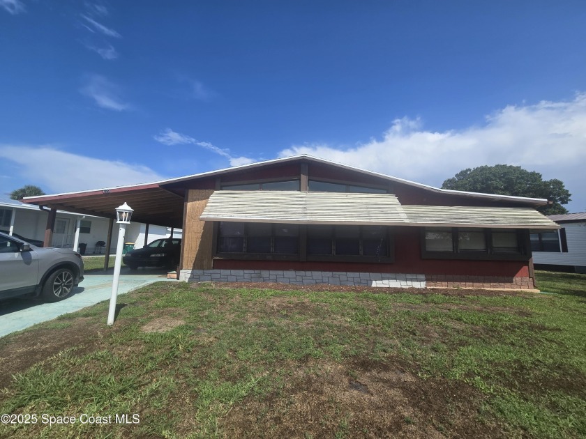 Partially renovated home is ready for handy owners or landlord - Beach Home for sale in Barefoot Bay, Florida on Beachhouse.com