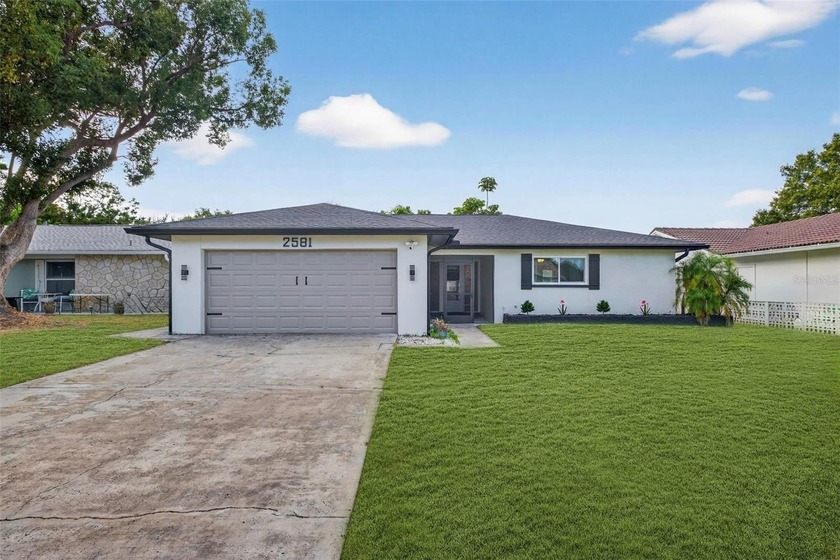 Move-in ready and beautifully updated, this 2 bedroom, 2 - Beach Home for sale in Clearwater, Florida on Beachhouse.com