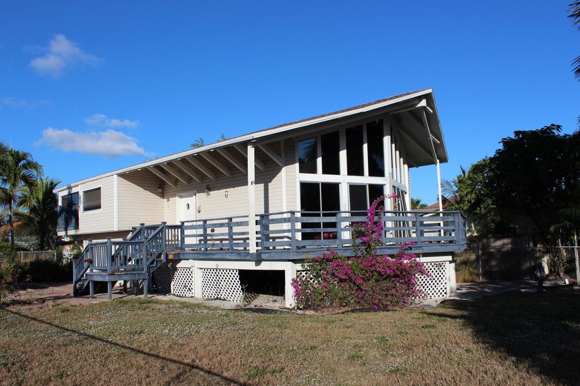 Distinctive Multi-Level Home on a Spacious Corner Lot. Step into - Beach Home for sale in Marco Island, Florida on Beachhouse.com