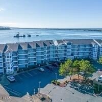 Experience coastal luxury in this Waters Edge condo nestled in - Beach Condo for sale in Lincoln City, Oregon on Beachhouse.com