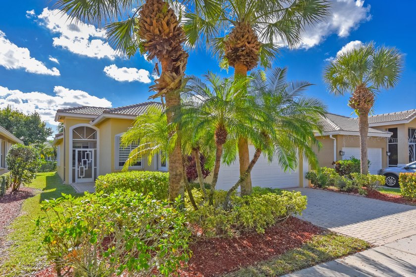 Generous split-plan single-family home featuring volume ceilings - Beach Home for sale in West Palm Beach, Florida on Beachhouse.com