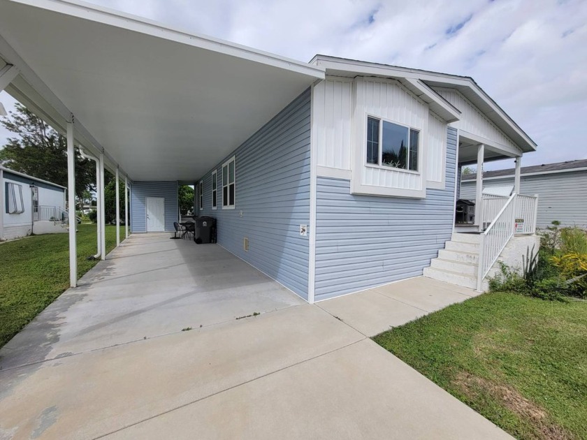 This barely lived-in, 3-bedroom, 2-bathroom home offers modern - Beach Home for sale in West Palm Beach, Florida on Beachhouse.com