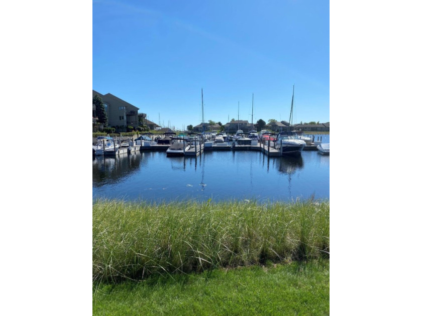 This fantastic 40' floating dock boat slip is located in the - Beach Lot for sale in Muskegon, Michigan on Beachhouse.com