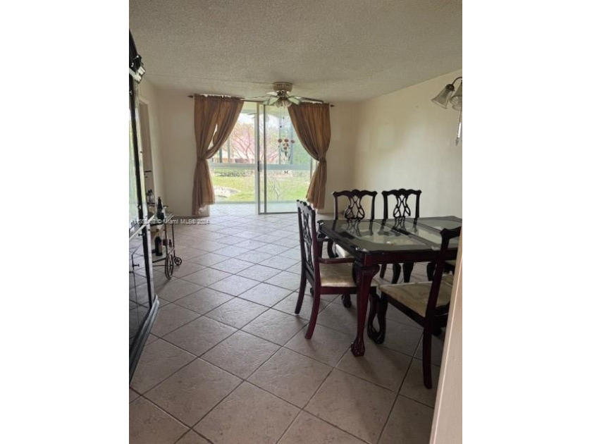 Nestled in a serene location with breathtaking views of the lake - Beach Condo for sale in Sunrise, Florida on Beachhouse.com