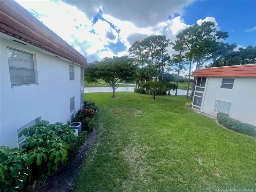 Fabulous view of the lake and golf course from the living and - Beach Condo for sale in Stuart, Florida on Beachhouse.com