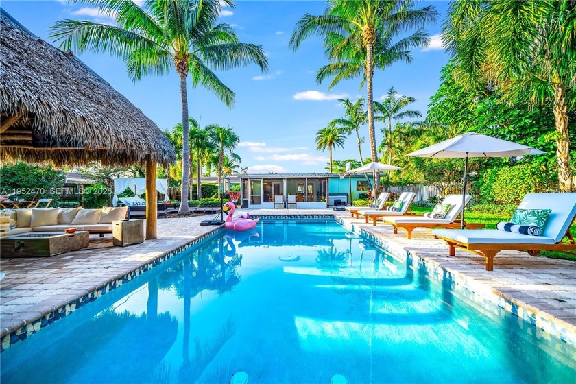 This 4-bedroom, 3-bath home features a split floor plan and open - Beach Home for sale in Pompano Beach, Florida on Beachhouse.com