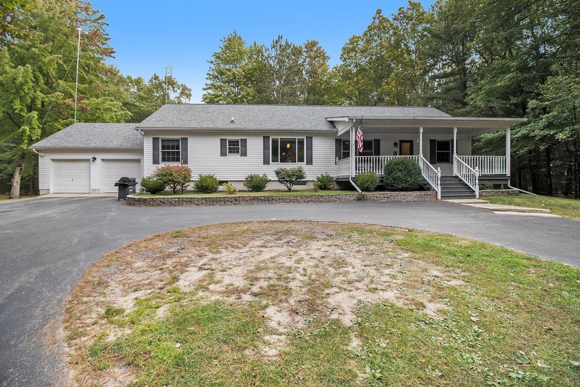 Enjoy peace and privacy on over 11 wooded acres just a short - Beach Home for sale in Manistee, Michigan on Beachhouse.com