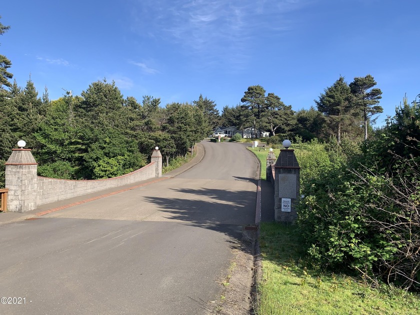 Located in a desirable gated 55+ community, this charming - Beach Lot for sale in Waldport, Oregon on Beachhouse.com