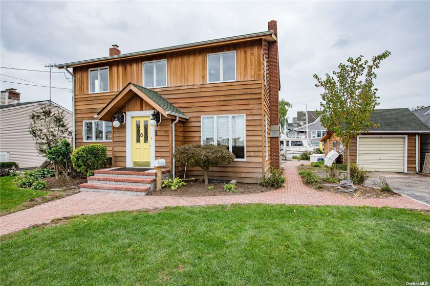 Beautiful Waterfront Home with 75Ft of bulkhead on a quiet canal - Beach Home for sale in Bay Shore, New York on Beachhouse.com