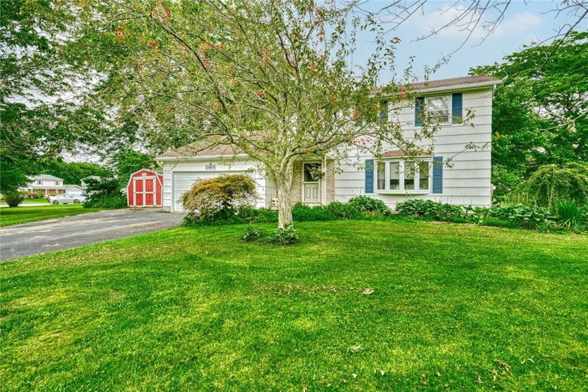 This adorable colonial home boasts 3 bedrooms and 1.5 bathrooms - Beach Home for sale in Webster, New York on Beachhouse.com