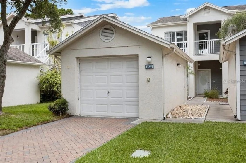 Move in ready condominium tucked beautifully into the - Beach Condo for sale in Largo, Florida on Beachhouse.com