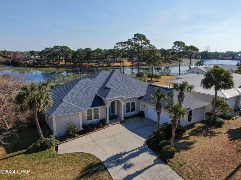 Welcome to your dream lakefront home! This stunning 4-bedroom - Beach Home for sale in Panama City Beach, Florida on Beachhouse.com