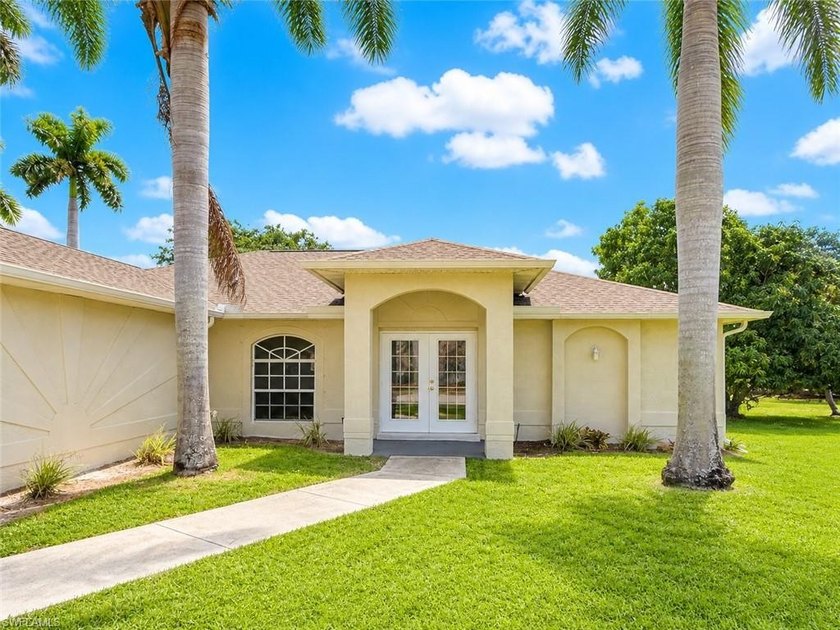 Spacious and immaculate, this 4-bedroom home in the heart of - Beach Home for sale in Cape Coral, Florida on Beachhouse.com