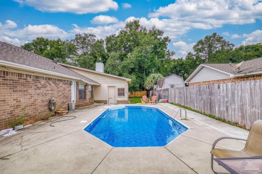 This charming corner pool home features 3 bedrooms and 2 full - Beach Home for sale in Pensacola, Florida on Beachhouse.com