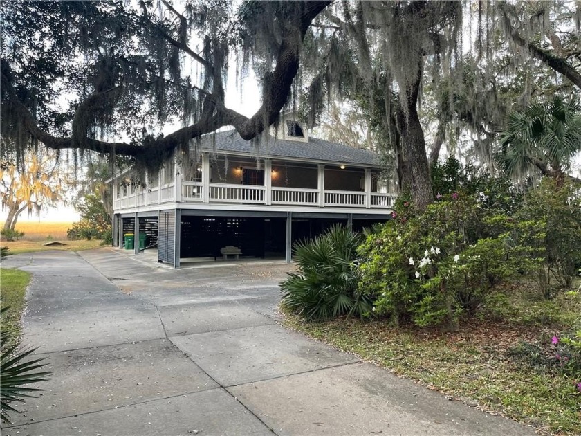 Spectacular waterfront property/home with dock in Sutherland - Beach Home for sale in Townsend, Georgia on Beachhouse.com