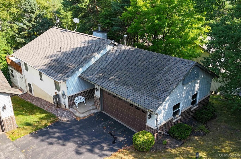 Welcome to this stunning 2-4 bedroom, 2 full bath home, ideally - Beach Condo for sale in Marquette, Michigan on Beachhouse.com