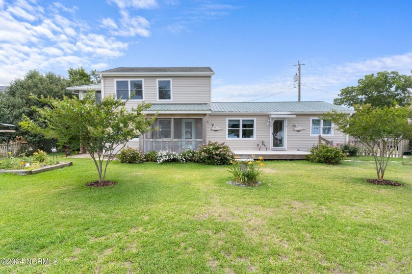 Nestled within the  Waterlily community, this meticulously kept - Beach Home for sale in Coinjock, North Carolina on Beachhouse.com