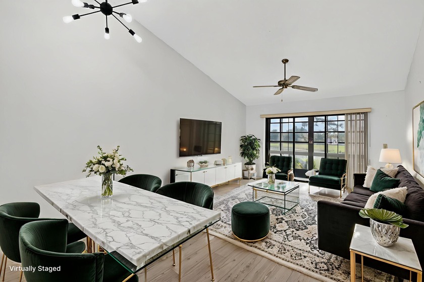 Enjoy stunning lake and golf course views right from your living - Beach Home for sale in Hobe Sound, Florida on Beachhouse.com