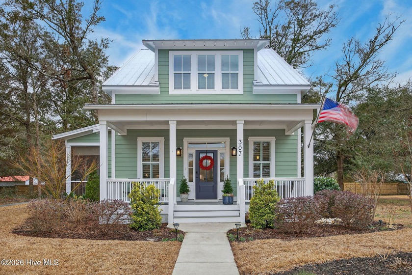 Tucked along the charmingly named Fire Fly Lane, this lovely - Beach Home for sale in Southport, North Carolina on Beachhouse.com