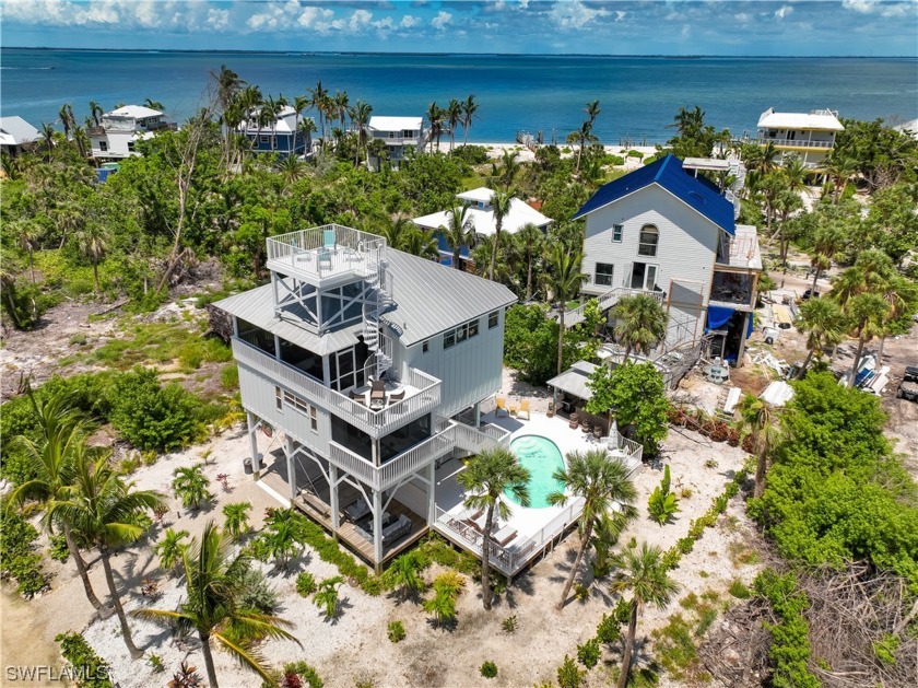 Located just two rooflines from the bay, this spacious reverse - Beach Home for sale in North Captiva Island, Florida on Beachhouse.com