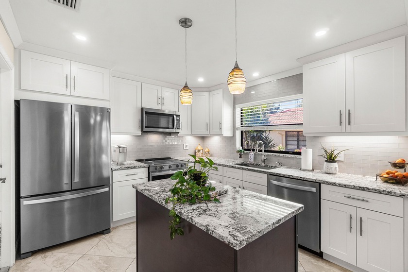 WELCOME TO THIS CHARMING NEIGHBORHOOD, IDEALLY LOCATED NEAR - Beach Home for sale in Boynton Beach, Florida on Beachhouse.com