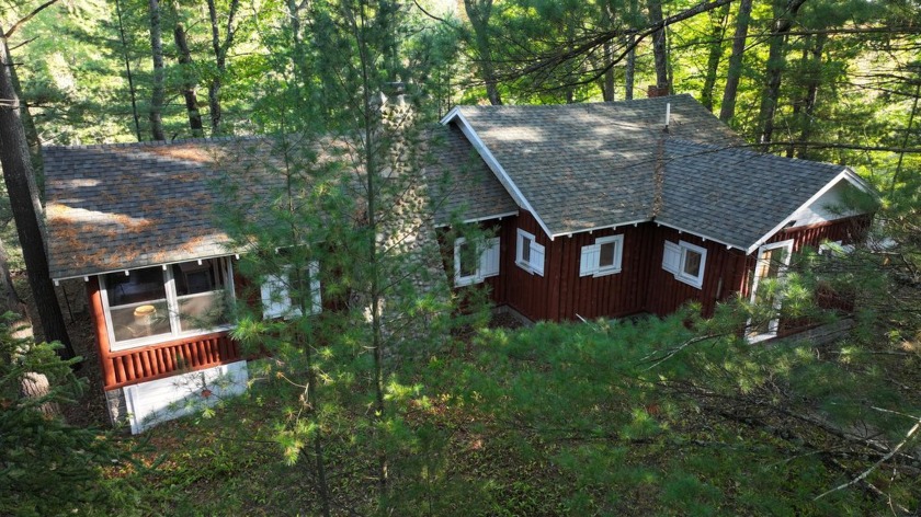 Charming vertical log home on 5.72 acres with 790' of frontage - Beach Home for sale in Manistee, Michigan on Beachhouse.com