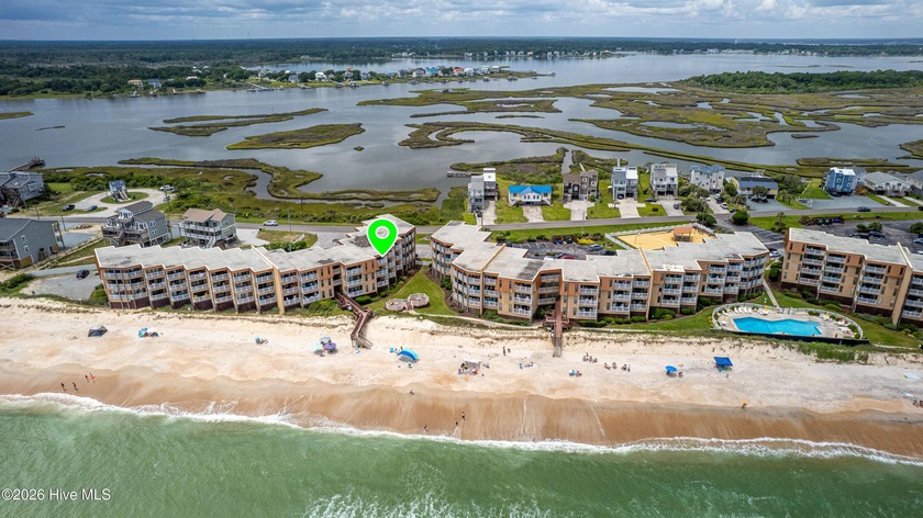 Relax and unwind in this peaceful oceanfront condo offering both - Beach Condo for sale in North Topsail Beach, North Carolina on Beachhouse.com