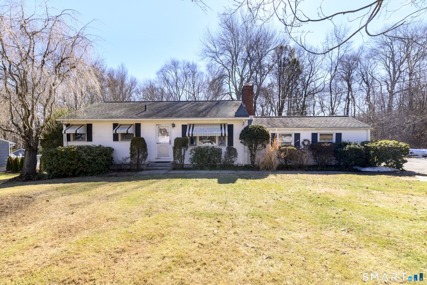 This mid-century ranch situated on a lovely .49 acres in the - Beach Home for sale in Fairfield, Connecticut on Beachhouse.com