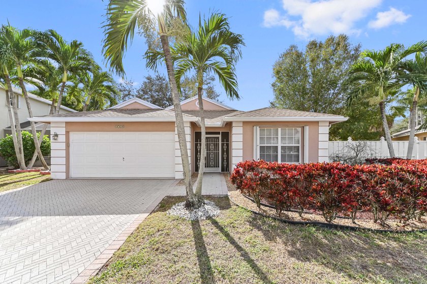Discover a spacious and serene waterfront retreat in this - Beach Home for sale in Greenacres, Florida on Beachhouse.com