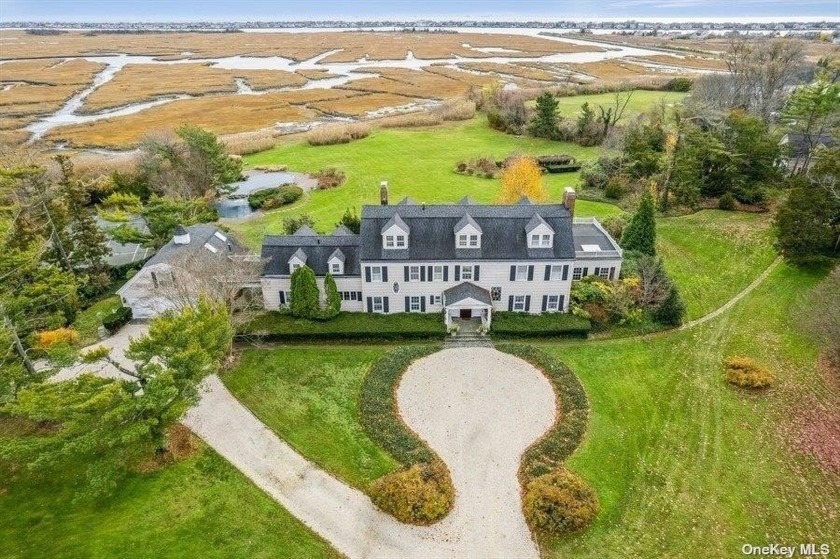 Located on a quiet cul-de-sac, this magnificent waterfront - Beach Home for sale in Lawrence, New York on Beachhouse.com