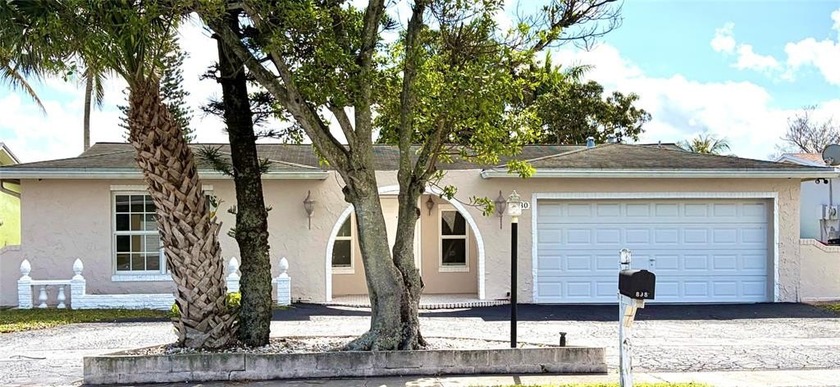 Wow! Another Amazingly stunning pool/waterfront, pool home with - Beach Home for sale in Sunrise, Florida on Beachhouse.com
