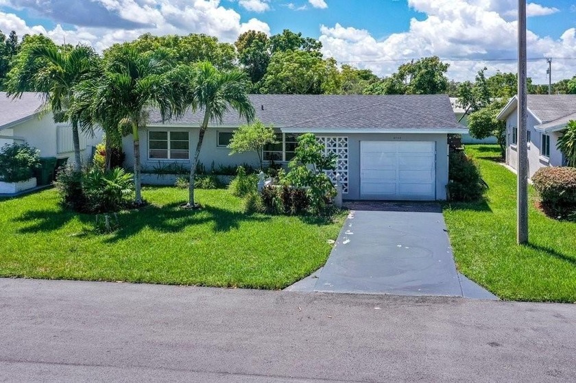 Well-maintained 2-bedroom, 2-bath single-family home located in - Beach Home for sale in Tamarac, Florida on Beachhouse.com