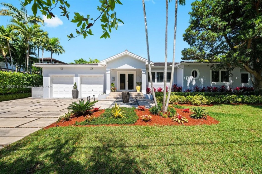 This exquisite 4-bedroom, 4.5-bathroom waterfront residence - Beach Home for sale in Coral Gables, Florida on Beachhouse.com