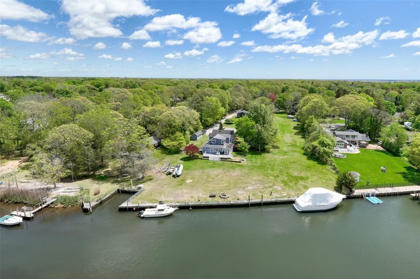 Historic Elegance Meets Waterfront Serenity...This extraordinary - Beach Home for sale in Center Moriches, New York on Beachhouse.com