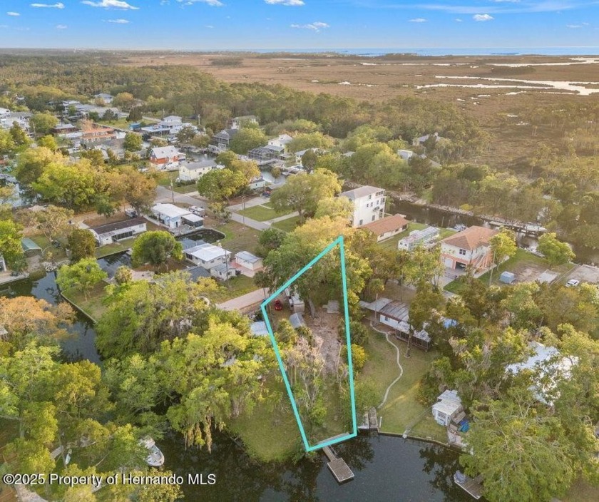 Waterfront Lot with Dock  RV Option - Ready for New Construction - Beach Lot for sale in Weeki Wachee, Florida on Beachhouse.com