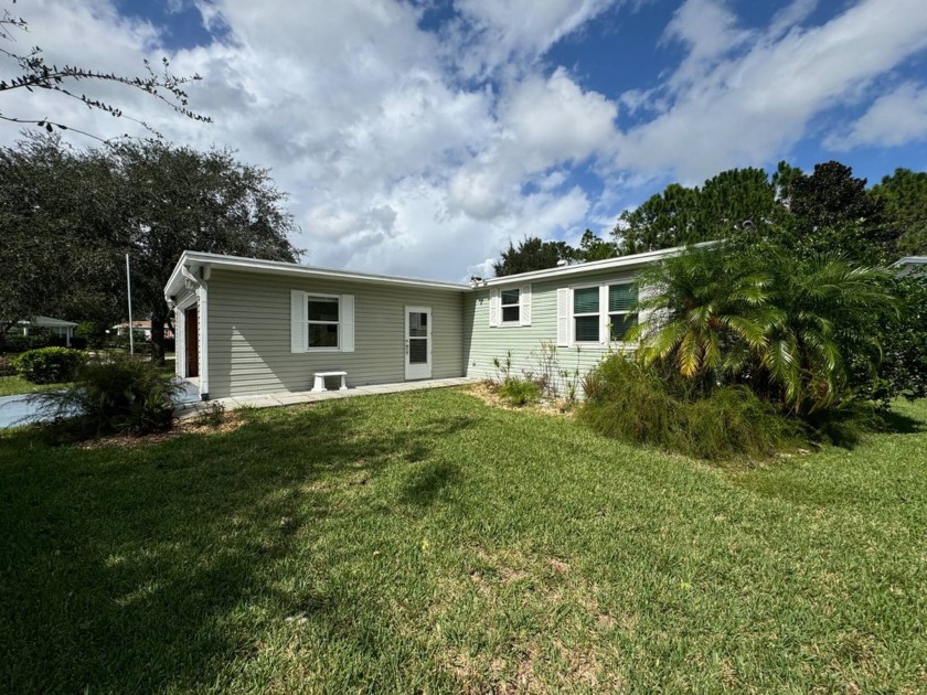 This spacious, well lit, split floorplan home with a garage is - Beach Home for sale in Ormond Beach, Florida on Beachhouse.com