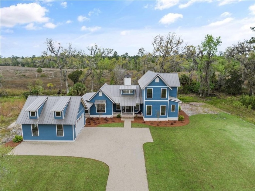 PRICE IMPROVEMENT! Welcome to this exceptional home situated on - Beach Home for sale in Brunswick, Georgia on Beachhouse.com