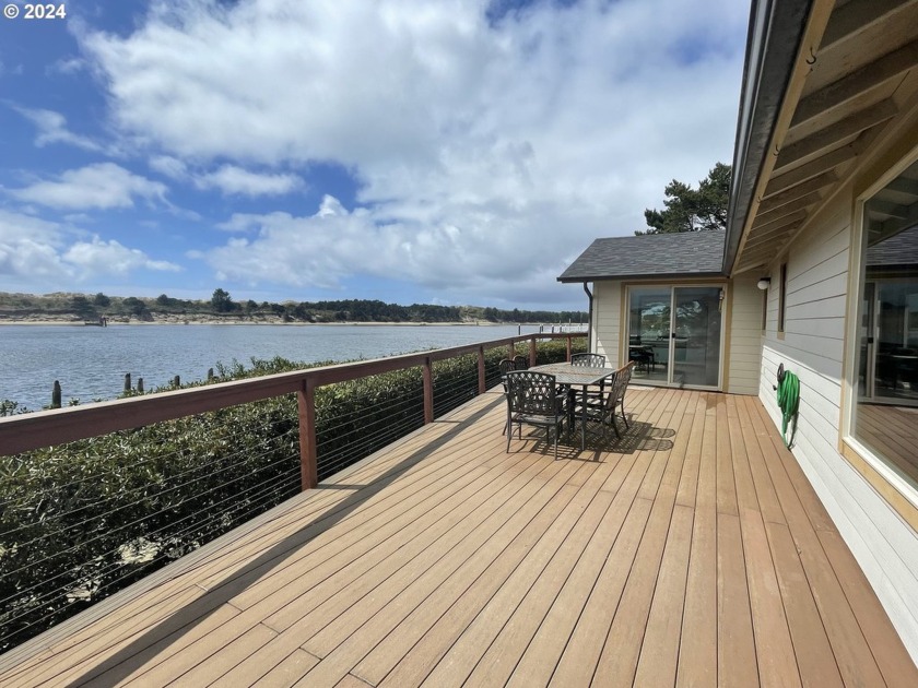 You don't want to miss this rare, Siuslaw Riverfront home! Warm - Beach Home for sale in Florence, Oregon on Beachhouse.com