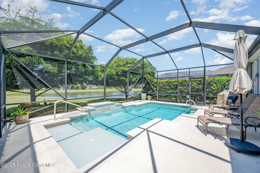 Lounge on the built-in beach of your sparkling, solar-heated - Beach Home for sale in Melbourne, Florida on Beachhouse.com