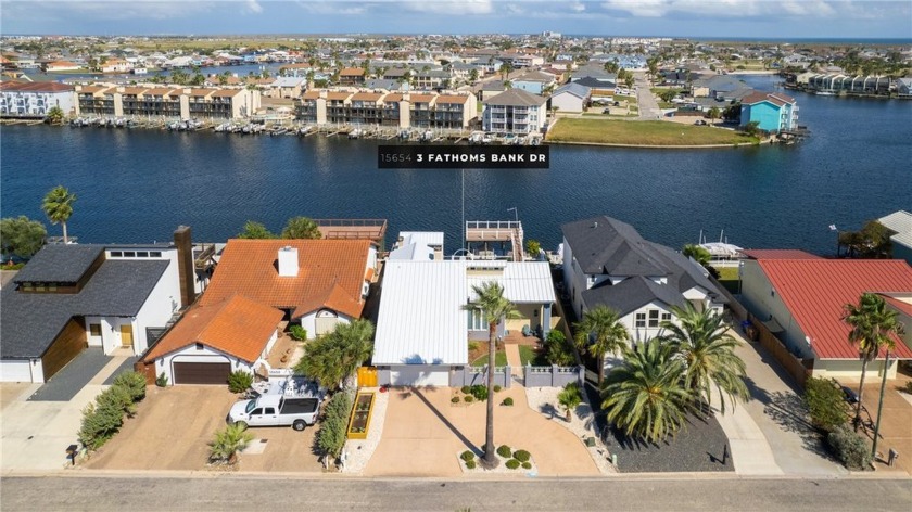 This home is *Island Living* at its finest! Located on one of - Beach Home for sale in Corpus Christi, Texas on Beachhouse.com