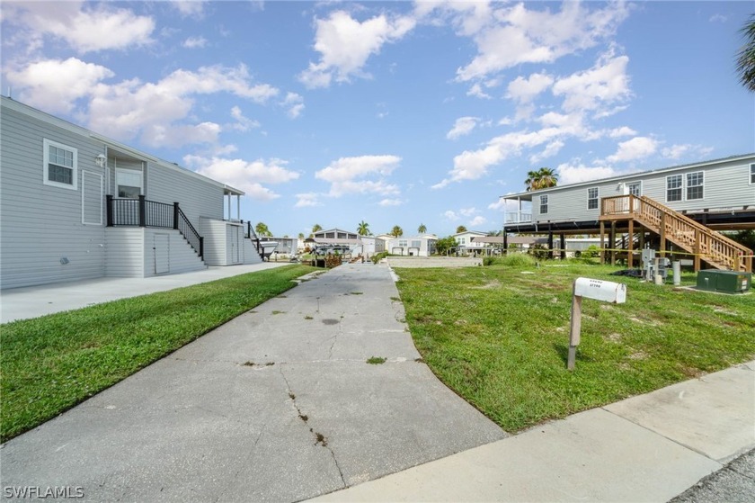 Discover the allure of Bayside Estates, a vibrant 55+ boating - Beach Lot for sale in Fort Myers Beach, Florida on Beachhouse.com