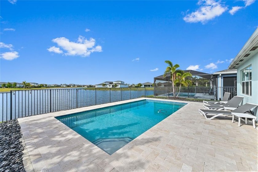 AMAZING sunsets to view from floating in your salt water-heated - Beach Home for sale in Port Saint Lucie, Florida on Beachhouse.com