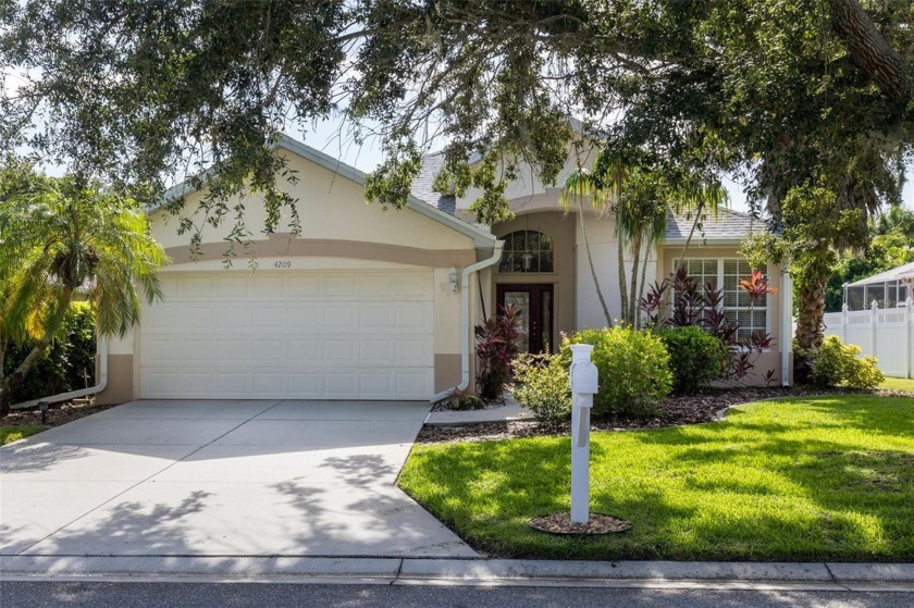 SERENE OASIS POOL AND SPA RETREAT, NESTLED AGAINST A TRANQUIL - Beach Home for sale in Bradenton, Florida on Beachhouse.com